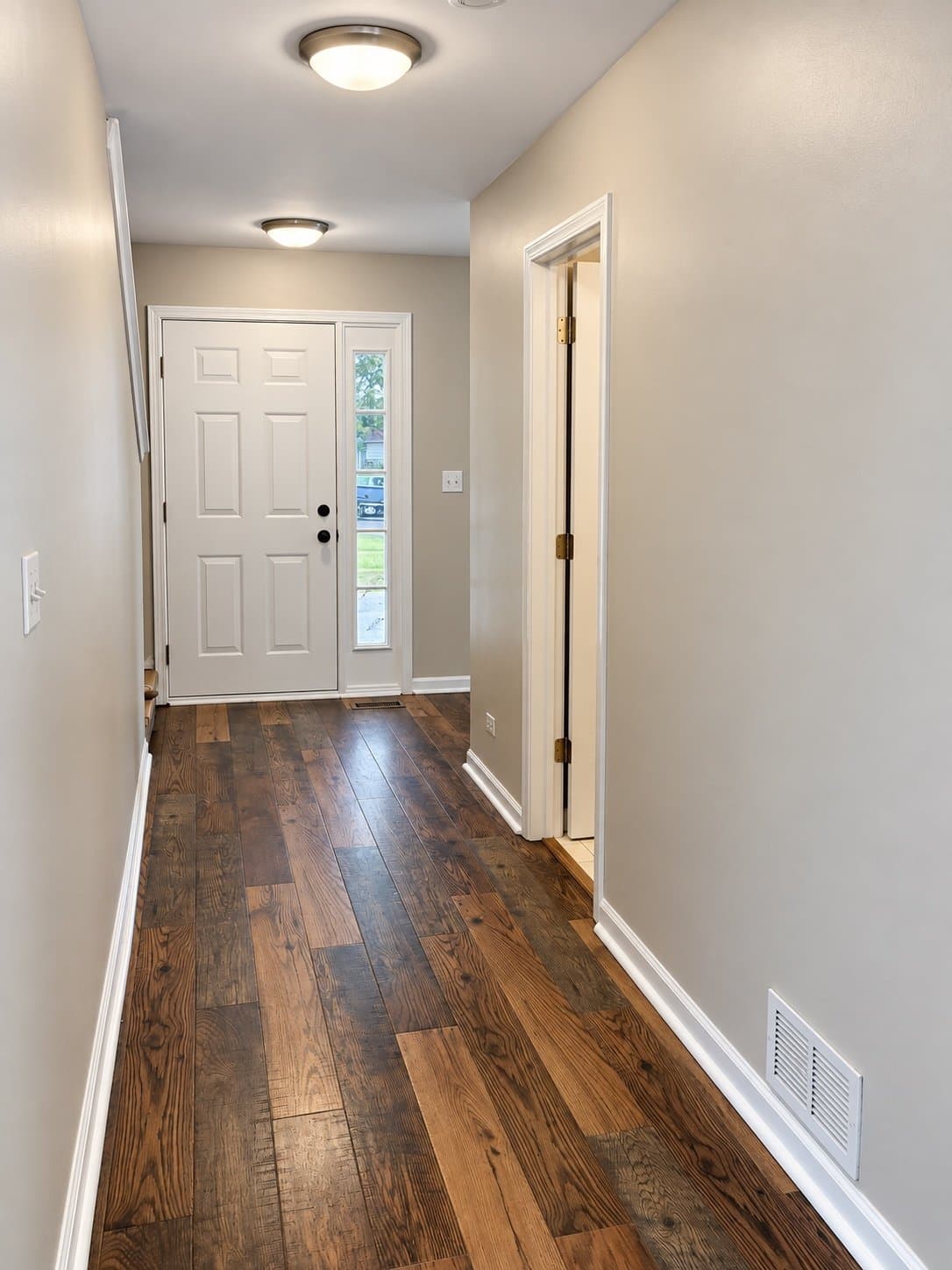 Entry hallway with new flooring (2026)