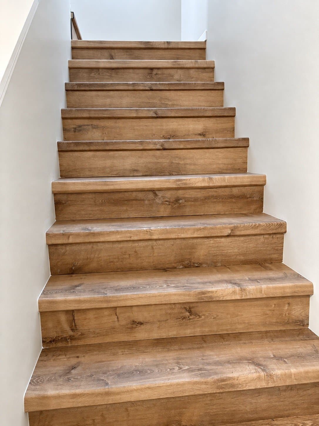 Staircase with new flooring (2026)