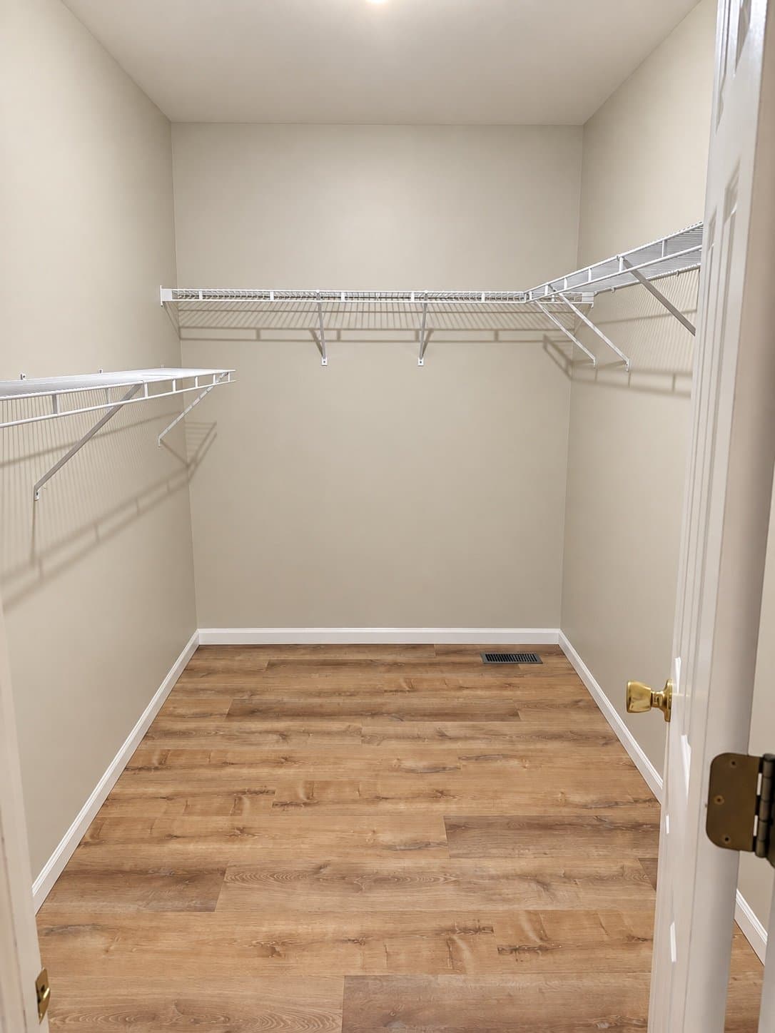Primary bedroom walk-in closet (2026)